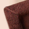 Close-up of the Turf chocolate towelling dog bed cover