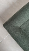 The Connemara dark olive boucle cover up close